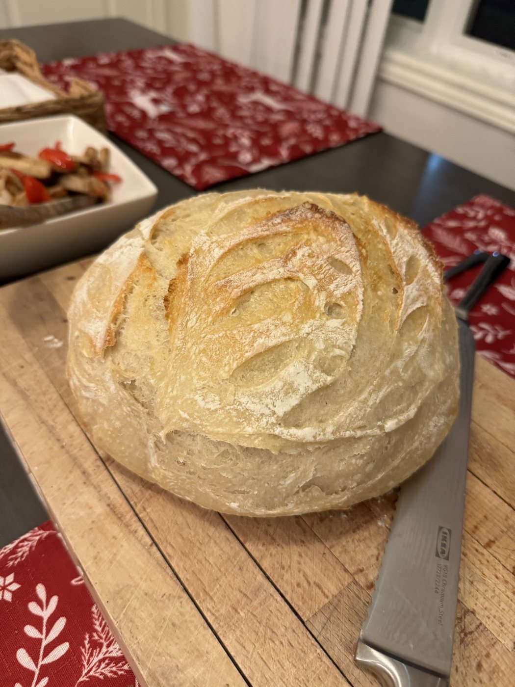 Round sourdough loaf baked by an Aterra Mills customer with our T55 flour
